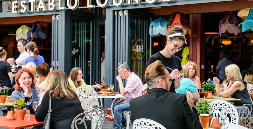 This is the terrace of a Loungers pub, a Zonal client